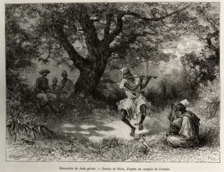 Möte med två grioter: kapten Binger, sittande i skuggan, njuter av föreställningen. Gravyr av Riou, för att illustrera berättelsen „Från Niger till Guineabukten“ av kapten Louis Gustave Binger (1856-1936), 1887-1889, i Le Tour du monde, nouveau journal