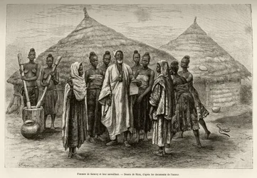 Samory Tourés (ca 1835-1898), krigshövding vid Nigerbågen, kvinnor och deras övervakare, en soninke, som kan läsa och skriva arabiska, vilket pappret han håller i handen visar. Gravyr av Riou för att illustrera berättelsen 