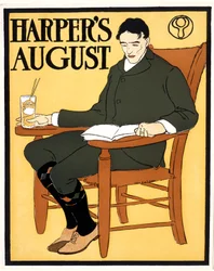 Man sittande i orange stol, hos August Harper