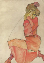 Knästående kvinna i orange-röd klänning, 1910