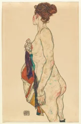 Stående naken med mönstrad mantel. 1917