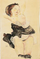 Ung flicka liggande, halvnaken, 1912