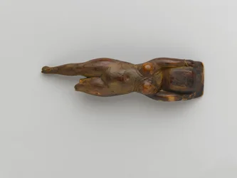 Toalettfat som hålls av en figur av en flytande kvinna, från Saqqara