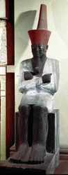 Egyptisk antikvitet: staty av farao Montuhotep II (eller Mentuhotep II). 11:e dynasti. Från Deir el Bahari. Dämpa. 83 cm. Kairo. Egyptiska museet