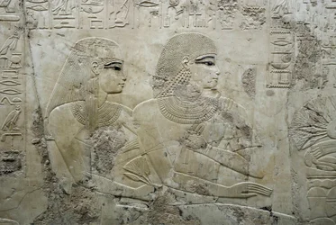 Egyptisk antikvitet: basrelief som representerar gästerna vid en begravningsbankett - Vizier Ramoses grav (18:e dynastin) - Luxor, Thebe, ädlarnas grav Egypten - Egyptisk civilisation: Basrelief föreställande gästerna vid en begravningsbankett, från graven
