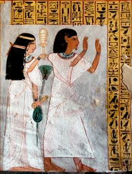 Egyptisk antikvitet: karaktärer i tillbedjan. Roys grav (TT255). 18:e dynasti. Från Västbanken av Luxor, Egypten - Forntida Egypten: Osiris dyrkas av ett par. Roys grav (TT 255). 18:e dynasti. Från västra stranden av Luxor, Egypten