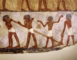 Fältarbetare plöjer för hand (muralmålning)