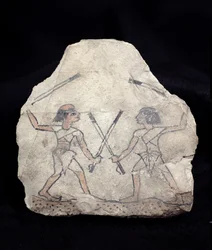 Ostrakon föreställer två män som slåss med käppar, från Deir El-Medina, New Kingdom (målad sten)