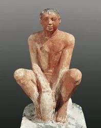 Egyptisk civilisation, målad kalkstensstaty som föreställer en man som formar lera, från Sakkara, Egypten, ca 2465, 400-talet f.Kr.