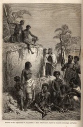 Kamehameha I (ca. 1758-1819), kung av Hawaiiöarna och grundare av deras enhet, omgiven av Hawaiikrigare och några undersåtar i Honolulu, gravyr efter teckning av Emile Bayard, som illustrerar resan till Sandwichöarna, 1855-69, av C