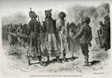 De tre vägvisarna (eller sovaerna), furstar av Dombe (Angola), och deras följe av musiker och en hovman kommer för att möta upptäcktsresanden S. Pinto. Gravyr av Emile Bayard för att illustrera berättelsen Hur jag korsade Afrika, från Atlanten till