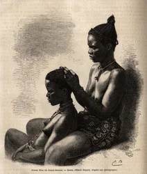 Unga flickor från Grand-Bassam (Grand Bassam) (tidigare huvudstad i Elfenbenskusten), stylar sig själv, graverar efter Emile Bayards teckning, illustrerar resan till den afrikanska kusten 1868, av viceamiral Fleuriot de Langles, publicerad i "" Le tour du 