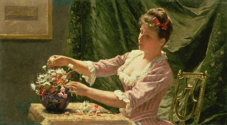 Ung kvinna som ordnar blommor