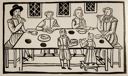 En familjemåltid, ca 1600 (sepiafoto)