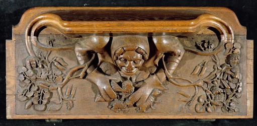 En misericord som visar en ogre med enorma axlar, New College Chapel, Oxford, sent 1300-tal (trä)