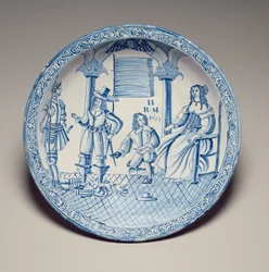 Fat med drottning Catherine sittande med en sko monterad av en knästående kavaljer, 1677 (tennglaserat lergods)
