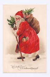 Edwardianskt vykort av jultomten som bär en julgran och en säck med leksaker över axeln, ca 1910 (färglitografi)