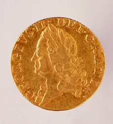 Gyllene engelska Guinea (guinee), kung George II:s regeringstid (1714-1760) 1700-talet. Diam. 2,5 cm Neapel, museo archeologico