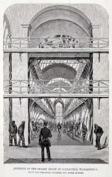 Interiör av Surrey House of Correction, Wandsworth, med fångarna som vänder ut efter middagen, från "The Criminal Prisons of London and Scenes of Prison Life" av Henry Mayhew (1812-87) och John Binny