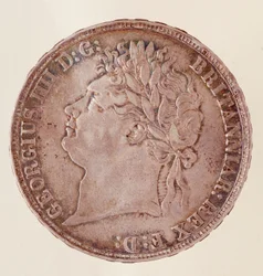 Engelsk krona i silver, kung George IV:s regeringstid (1820-1830). Diam. 3,7 cm Neapel, museo archeologico