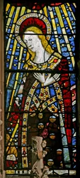 Östra fönstret (Ew) föreställande Jungfru Maria (sammansatt figur) - med juveler av infällt glas
