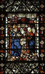 Fönster w58 föreställande St Thomas Becket med en fånge och 2 andra figurer