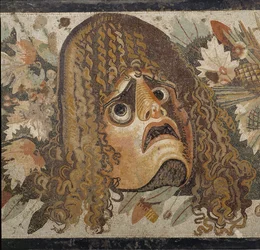 Festong med masker, löv och frukt