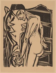 Naken kvinna före ett kabinett, 1916.