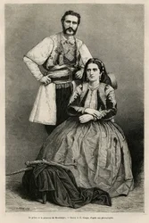 Porträtt av furst Nikola I Petrović-Njegoš av Montenegro (1841-1921) och hans hustru Milena, född Vukotić (1847-1923), teckning av E. Ronjat som illustration till Charles Yriartes (1832-1898) resa till Montenegro 1874. Gravyr i Le Tour du