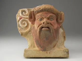 Antefix i form av ett Satyrhuvud, mitten av 400-talet (terrakotta med pigment)
