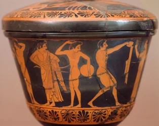 Pyxis med idrottare som utför diskus och andra grenar. Rödfigurkeramik, från Cerveteri (Lazio). Etruskisk civilisation, 400-talet f.Kr.