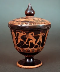 Pyxis med representation av scen av palaestra, terrakotta, 520-500 f.Kr.