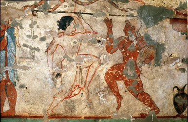 Rituell dans, ung kvinna klädd i en genomskinlig tunika och naken ung man. (Detalj av fresk, 520 f.Kr.)