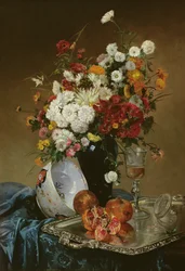 Stilleben med blommor och granatäpplen