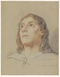 Huvudet av en ung man med långt hår