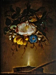 Ett stilleben med en bukett blommor hängande nära ett ljus