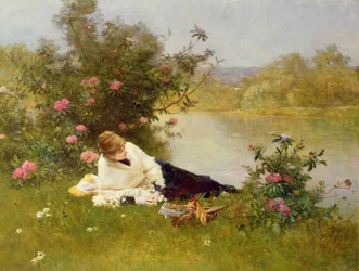 Kvinna på en flodstrand