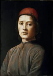 Porträtt av en ung man med en röd hatt Målning av filippinska Lippi (1457-1504) 1400-talet Florens, Galleria degli Uffizi (Kontor)