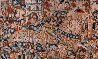 flamländsk gobeläng. Serien Det trojanska kriget. Förstörelsen av Troja (Destrucción de Troya). Elfte gobeläng i serien. Modell Coëtivy Master (Henry eller Conrard de Vulcop). Tillverkar Tournai-verkstäder. Ca 1470. Tyg Ull och siden, 6/7 varp per cm.