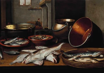 En köksinredning med fisk och redskap på ett bord