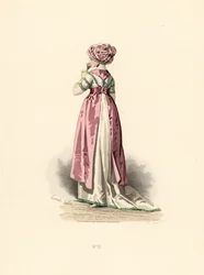 Kvinna i vit klänning och corsage med grön kant, rosa förkläde.
