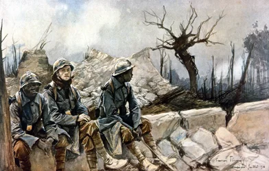 3 franska soldater sittande framför ruinerna av kyrkan i Dampierre. Krig 1914 - 1918. Paris, Musée de l