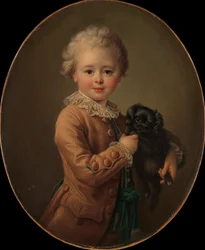 Pojke med en svart spaniel