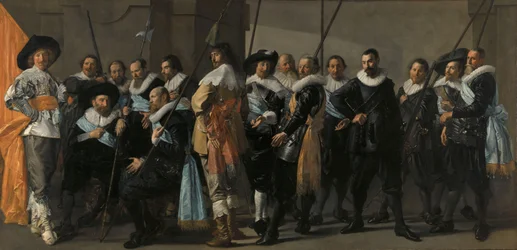 Miliskompani i distrikt XI under befäl av kapten Reynier Reael, känd som "Det magra kompaniet" Officerare och andra gardister från XI:e distriktet i Amsterdam, under befäl av kapten Reijnier Reael och löjtnant Cornelis Michielsz Blaeuw,