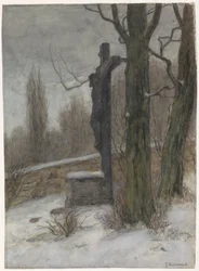 Krucifix i en snöig skog