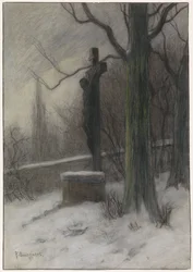 Krucifix i en snöig skog