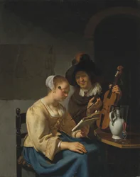 Kvinna med noter och en man med violin