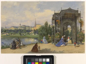 Stadspark med järnpaviljong och utsikt över staden