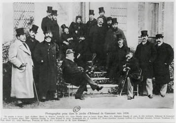 Grupp i Edmond Huot de Goncourts trädgård, ca 1890