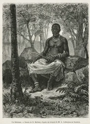En feticheur, trollkarl som kan använda fetichernas magiska kraft, teckning av D.Maillart, för att illustrera berättelsen om en resa till Gabon och Ogoue-floden, 1875-1877, av Alfred Marche. Gravyr i Le tour du monde